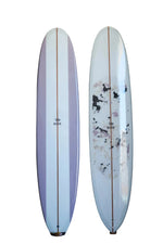 Two surfboards with unique designs against a black background